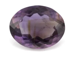 High-resolution image of the Original Amethyst Stone 6.70 Carat (7.36 Ratti) Jamunia showcasing its vibrant blue-purple hues and flawless oval cut.