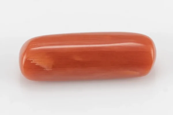 Moonga Stone (Red Coral) 6.77 Ratti (6.165 Carat) showcasing vibrant red color and capsule cut