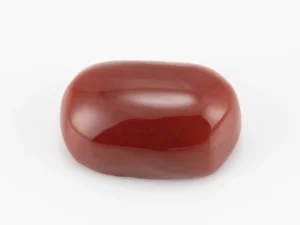 Moonga Stone 6.05 Ratti - Red Coral Stone showcasing vibrant red color and oval-capsule cut