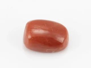 Moonga Stone 6.08 Ratti - Red Coral Stone showcasing vibrant red color and oval-capsule cut