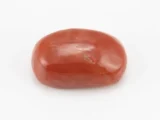 Moonga Stone 6.12 Ratti - Red Coral Stone showcasing vibrant red color and oval-capsule cut