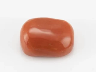 Moonga Stone 6.48 Ratti - Red Coral Stone showcasing vibrant red color and oval-capsule cut