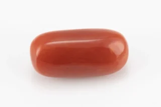 Moonga Stone 6.64 Ratti - Red Coral Stone showcasing vibrant red color and capsule-oval mix cut