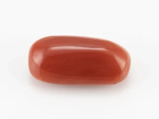 Moonga Stone 6.78 Ratti - Red Coral Stone showcasing vibrant red color and capsule-oval mix cut