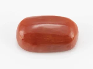Moonga Stone 7.03 Ratti - Red Coral Stone showcasing vibrant red color and oval-round cut
