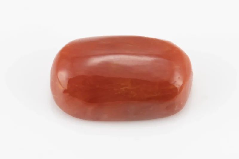 Moonga Stone 7.03 Ratti - Red Coral Stone showcasing vibrant red color and oval-round cut