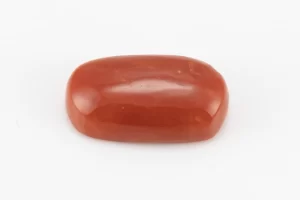 Moonga Stone 7.14 Ratti - Red Coral Stone showcasing vibrant red color and oval-capsule cut