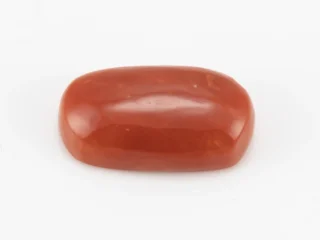 Moonga Stone 7.14 Ratti - Red Coral Stone showcasing vibrant red color and oval-capsule cut