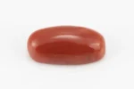 Moonga Stone 7.34 Ratti - Red Coral Stone showcasing vibrant red color and oval-round cut