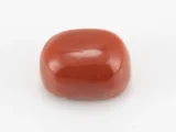 Moonga Stone 7.54 Ratti - Red Coral Stone showcasing vibrant red color and oval-capsule cut