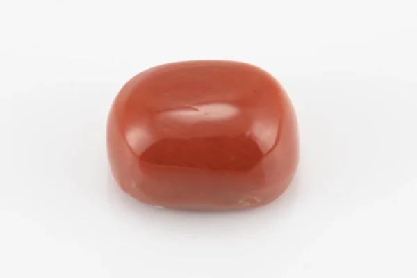 Moonga Stone 7.54 Ratti - Red Coral Stone showcasing vibrant red color and oval-capsule cut