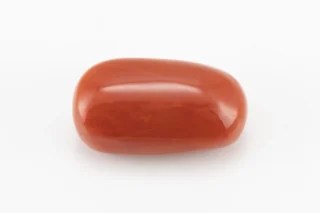 Moonga Stone 7.65 Ratti - Red Coral Stone showcasing vibrant red color and capsule-oval mix cut