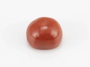 Moonga Stone 7.79 Ratti - Red Coral Stone showcasing vibrant red color and oval-capsule cut