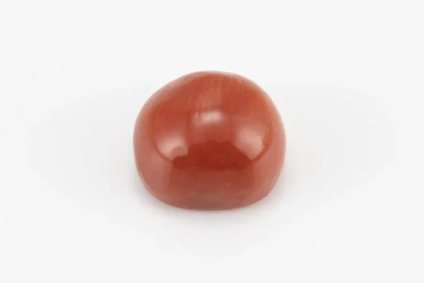 Moonga Stone 7.79 Ratti - Red Coral Stone showcasing vibrant red color and oval-capsule cut