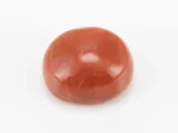 Moonga Stone 8.02 Ratti - Red Coral Stone showcasing vibrant red color and oval-round cut