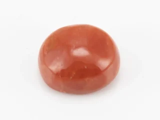 Moonga Stone 8.02 Ratti - Red Coral Stone showcasing vibrant red color and oval-round cut