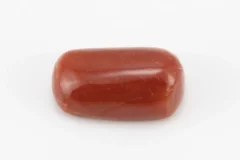 Moonga Stone 8.25 Ratti - Red Coral Stone showcasing vibrant red color and oval-capsule cut