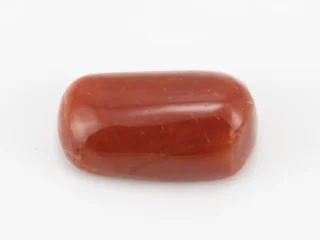 Moonga Stone 8.25 Ratti - Red Coral Stone showcasing vibrant red color and oval-capsule cut