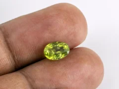 Natural Peridot Stone 2.09 Carat (2.30 Ratti) - In Palm