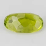 Natural Peridot Stone 2.50 Carat (2.75 Ratti) - Back view