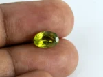 Natural Peridot Stone 2.50 Carat (2.75 Ratti) - In Palm