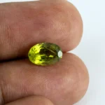 Natural Peridot Stone 2.50 Carat (2.75 Ratti) - In Palm