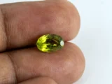 Natural Peridot Stone 2.50 Carat (2.75 Ratti) - In Palm