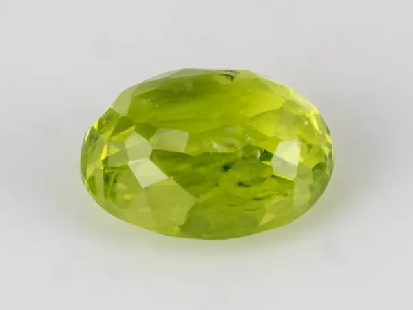 Natural Peridot Stone 3.51 Carat (3.81 Ratti) - Back View