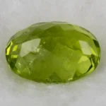 Natural Peridot Stone 3.57 Carat (3.92 Ratti) - Back view