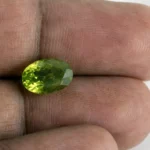 Natural Peridot Stone 3.57 Carat (3.92 Ratti) - In Palm