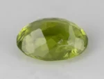 Natural Peridot Stone 3.64 Carat (4.00 Ratti) - Back view