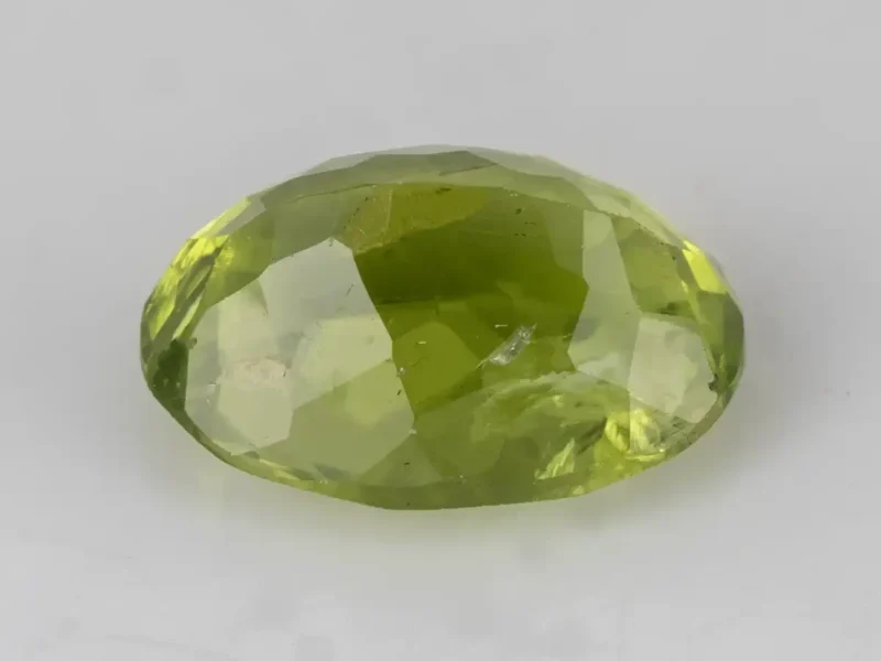 Natural Peridot Stone 3.64 Carat (4.00 Ratti) - Back view