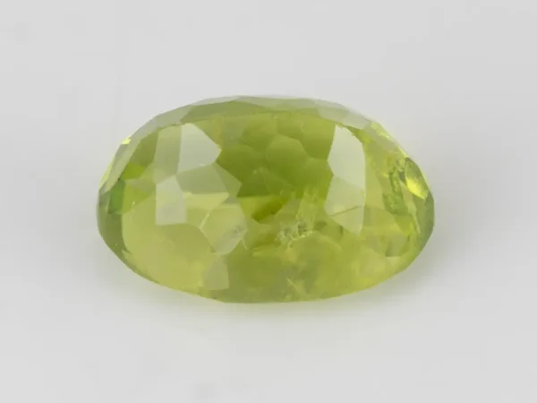 Natural Peridot Stone 3.86 Carat (4.24 Ratti) - Back view