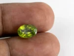 Natural Peridot Stone 3.86 Carat (4.24 Ratti) - In Palm