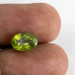 Natural Peridot Stone 3.86 Carat (4.24 Ratti) - In Palm