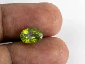 Natural Peridot Stone 3.86 Carat (4.24 Ratti) - In Palm