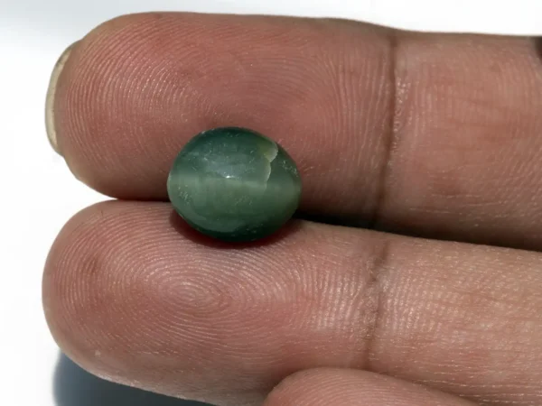 Natural Quartz Cat’s Eye Gemstone (Lahsuniya Ratna) – 5.24 Carat (5.76 Ratti) - in palm