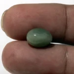 Natural Quartz Cat’s Eye Gemstone (Lahsuniya Ratna) – 5.78 Carat (6.35 Ratti) - in palm