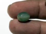 Natural Quartz Cat’s Eye Gemstone (Lahsuniya Ratna) – 6.71 Carat (7.37 Ratti) - in palm