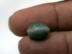 Natural Quartz Cat’s Eye Gemstone (Lahsuniya Ratna) – 8.05 Carat (8.85 Ratti) - in palm