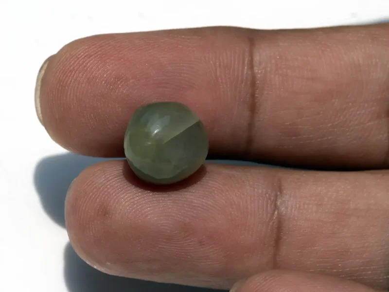 Quartz Cat’s Eye Gemstone (Lahsuniya Ratna) – 8.33 Carat (9.15 Ratti) - in palm