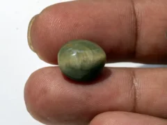 Natural Quartz Cat’s Eye Gemstone (Lahsuniya Ratna) – 8.35 Carat (9.17 Ratti) - in palm