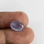 Natural Tanzanite Stone 6.08 Carat (6.68 Ratti) - In hand
