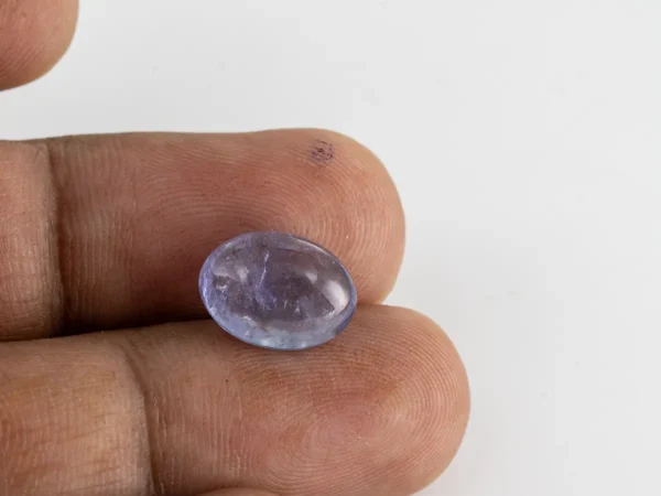 Natural Tanzanite Stone 6.08 Carat (6.68 Ratti) - In hand