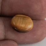 Natural Tiger Eye Stone 5.32 Carat (5.85 Ratti) – In hand
