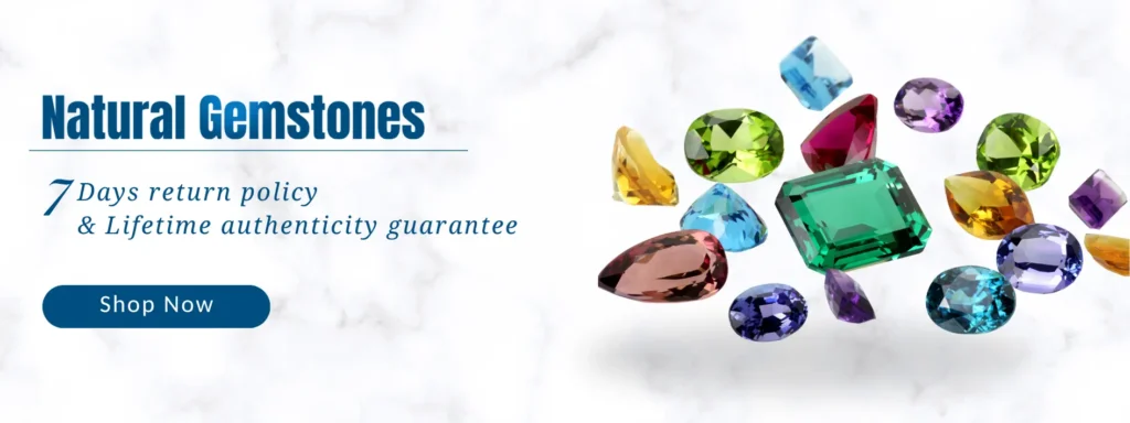 Vibrant display of natural precious and semi-precious gemstones, including rubies, sapphires, emeralds, and amethysts
