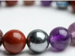 Close-up of multi-colour seven chakra natural beads bracelet