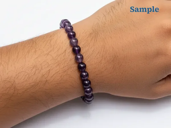 wearing a natural amethyst bracelet on wrist