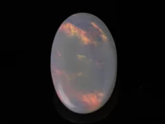 Side view of an Australian Fire Opal 3.50 Carat (3.85 Ratti)