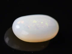 Side view of an Australian Fire Opal 4.64 Carat (5.10 Ratti)